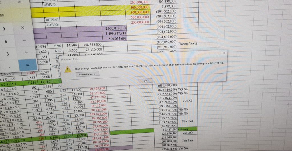 Lỗi excel because of a sharing violation. try saving to a different file